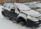 Злоумышленники сняли колеса с машины депутата Александра Бурмистрова после сессии горсовета