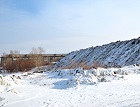 Мэр Новосибирска потребовал ликвидировать снегоотвал в Октябрьском районе